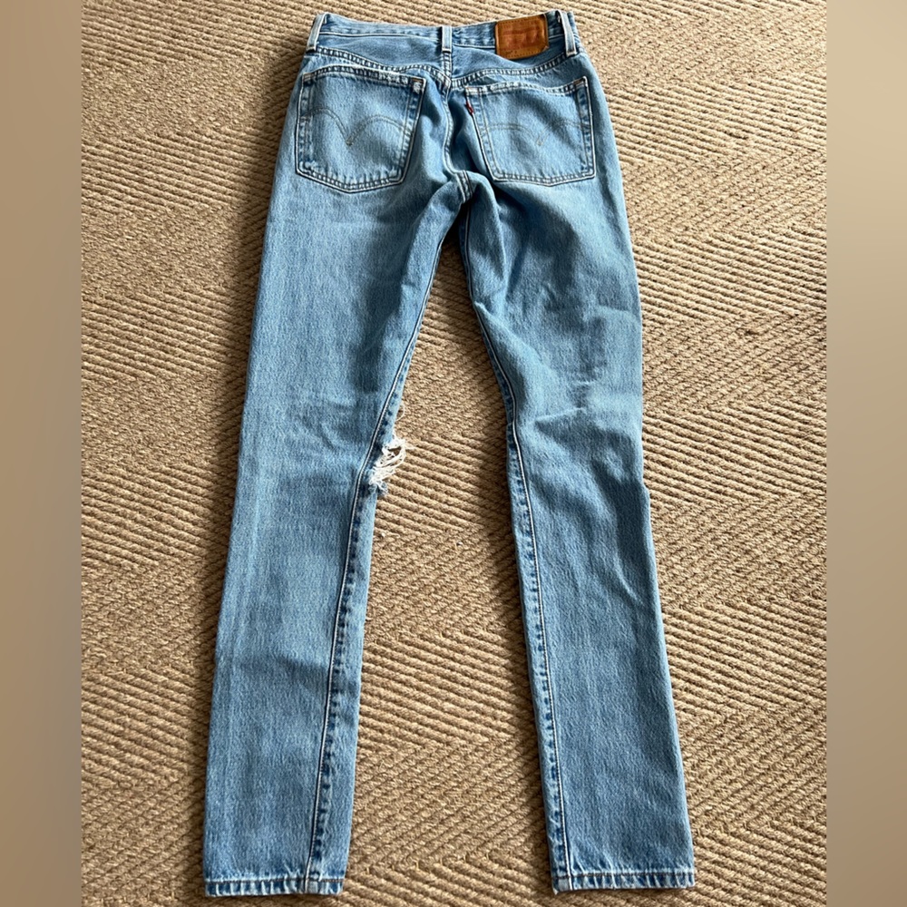 Distressed 501 straight leg size 24